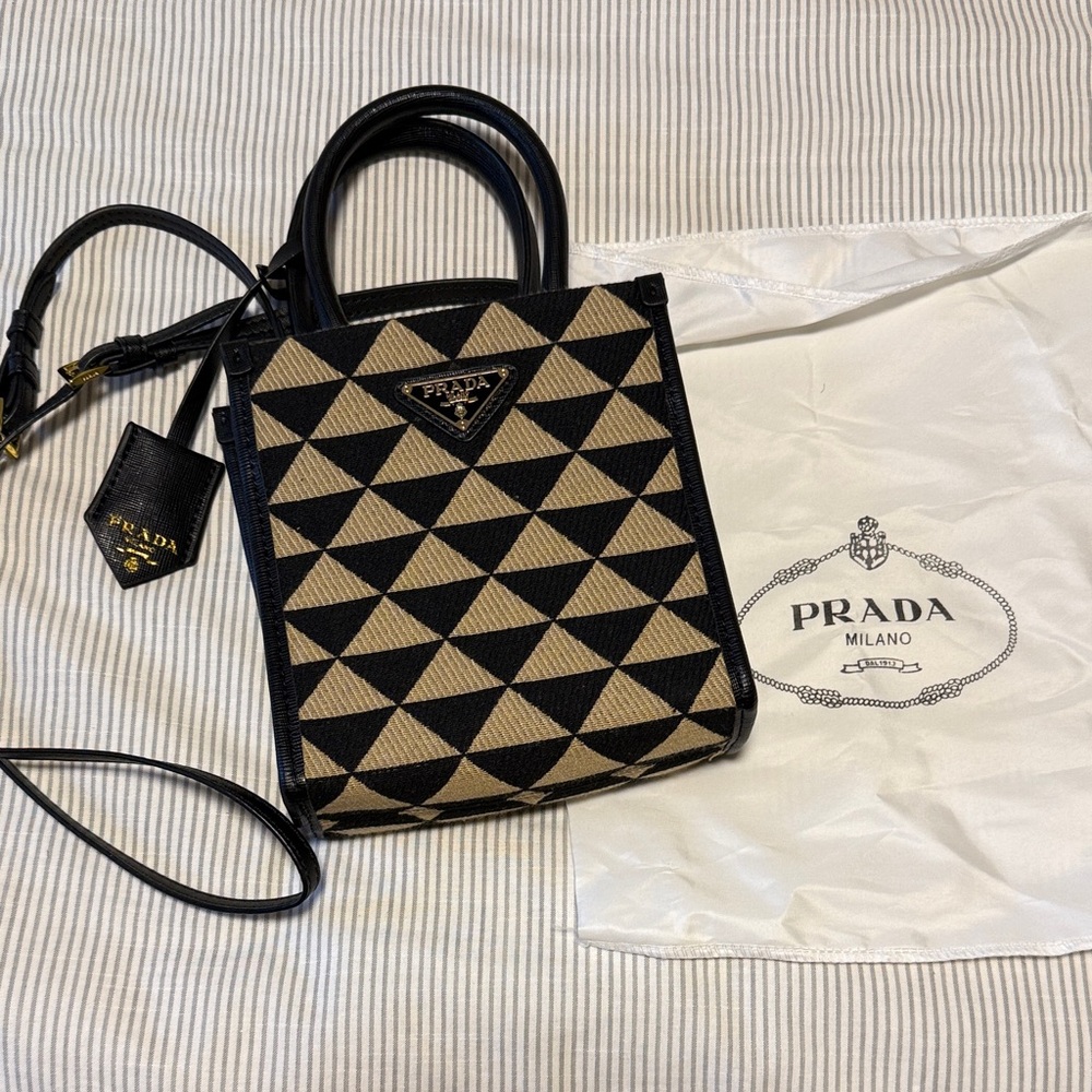 Non authentic Black and Tan Symbole bag